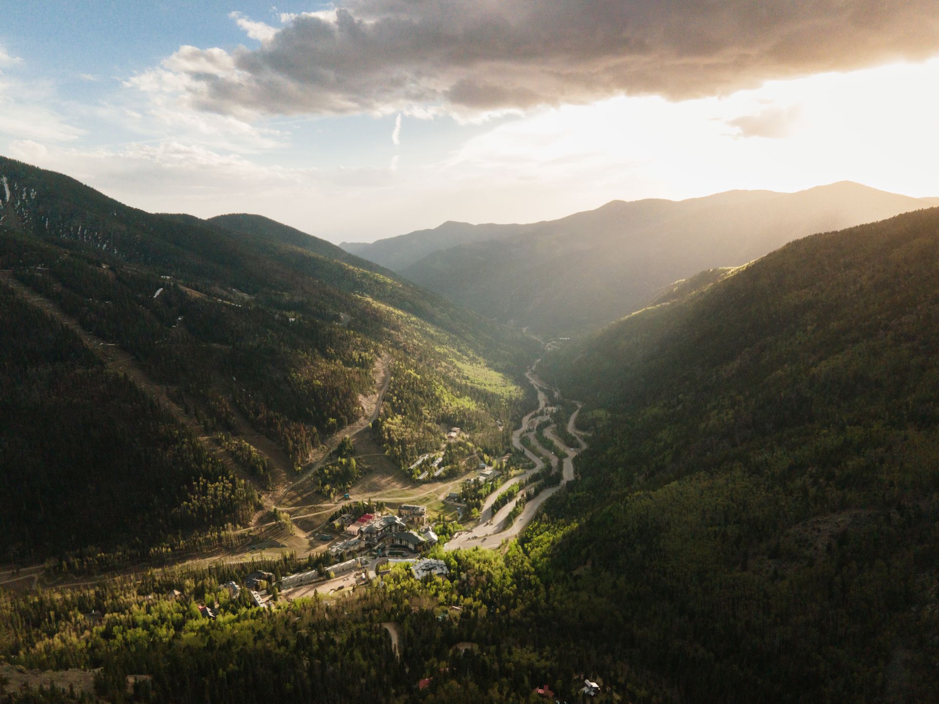 A heightened view of Taos Ski Valley in the summertime.