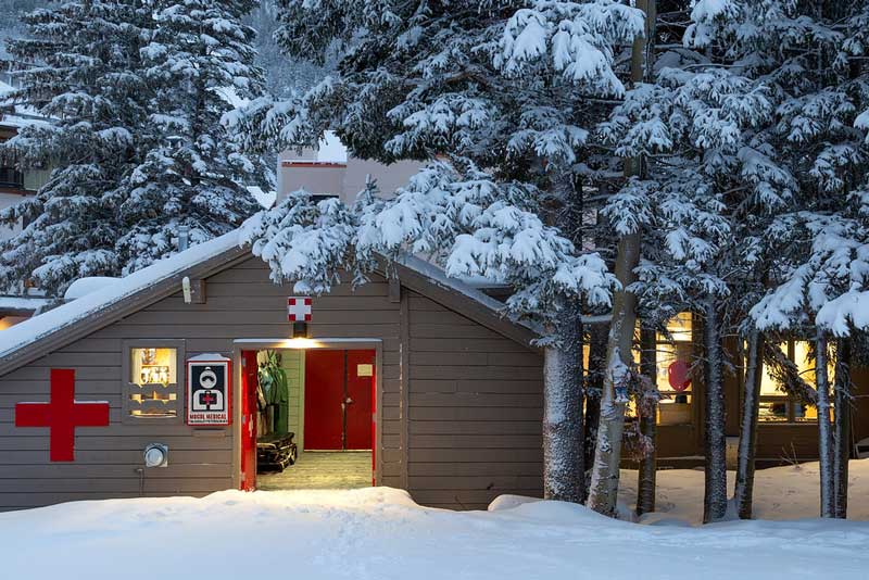 The Mogul Medical Urgent Care Building covered in snow.